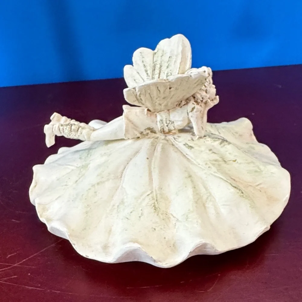 Vintage 1980 Avon Lily Fairy Daydreaming trinket or keepsake box.